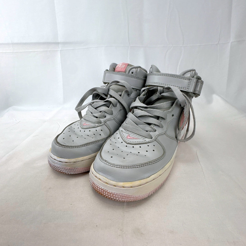 Women's Nike Air Force 1 Mid sneakers in grey leather with pink accents and ankle strap, size 7.5
