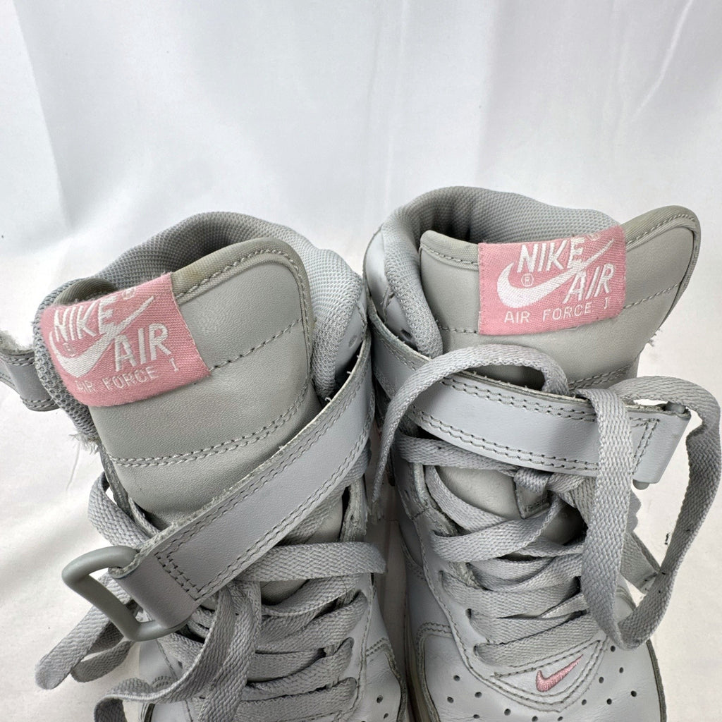Women's Nike Air Force 1 Mid sneakers in grey leather with pink accents and ankle strap, size 7.5