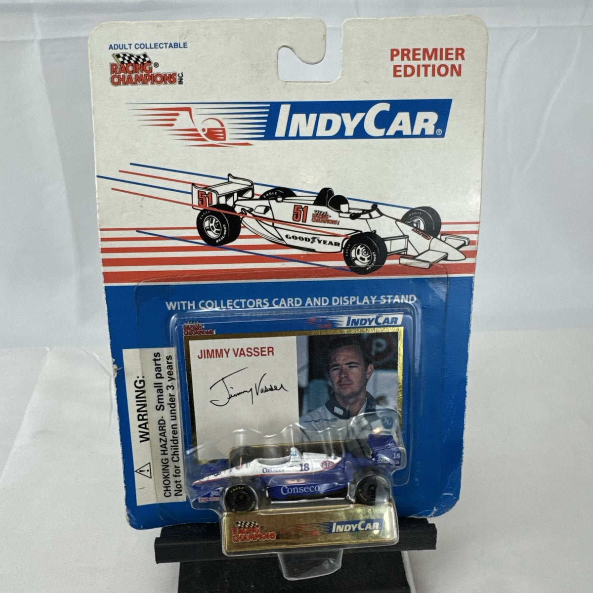 1994 Racing Champions Jimmy Vasser #18 Conseco IndyCar 1:64 scale diecast car sealed on original card with stand