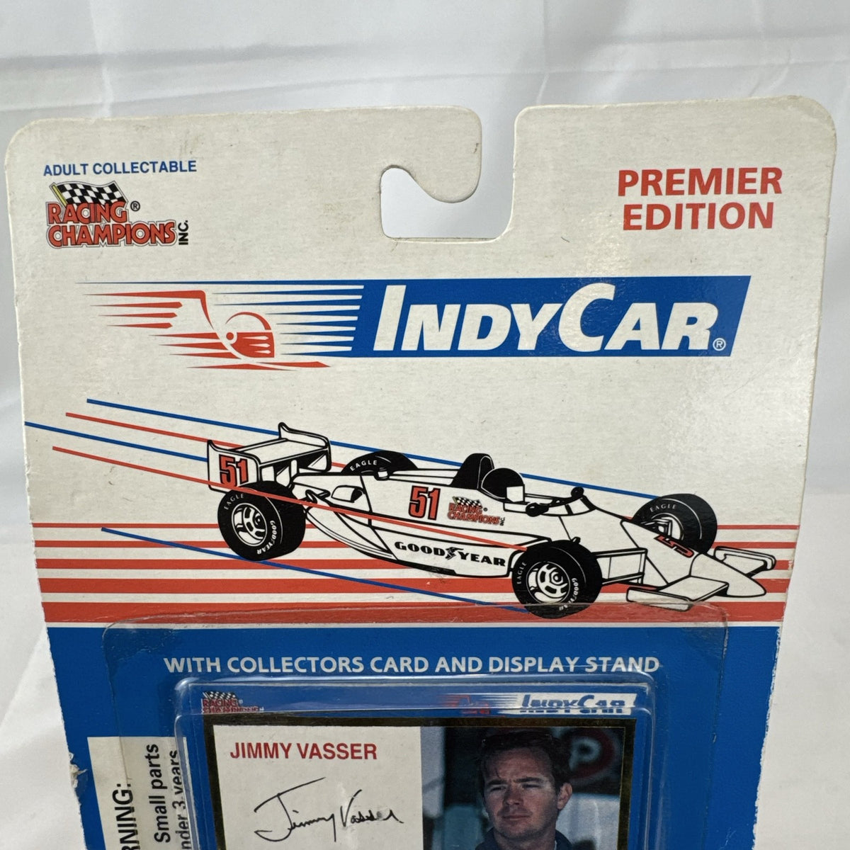 1994 Racing Champions Jimmy Vasser #18 Conseco IndyCar 1:64 scale diecast car sealed on original card with stand