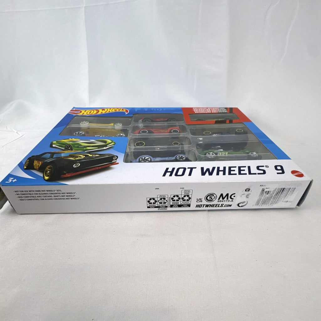 Hot Wheels 1:64 scale diecast 9-car gift set featuring exclusive metallic green Le Mans racer and off-road buggies.