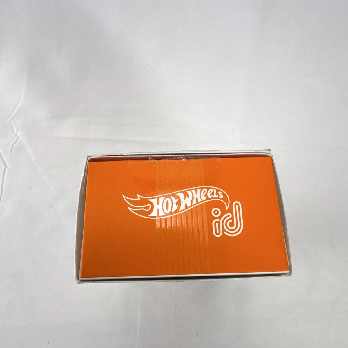 Hot Wheels id Mach Speeder 1:64 scale diecast car in white with cyber graphics in original packaging