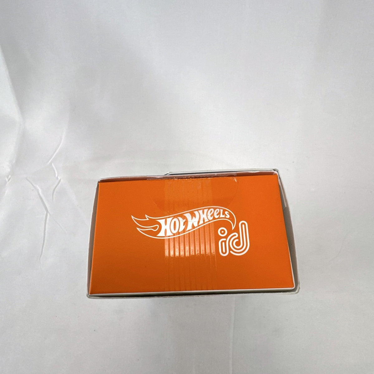 Hot Wheels id Mach Speeder 1:64 scale diecast car in white with cyber graphics in original packaging