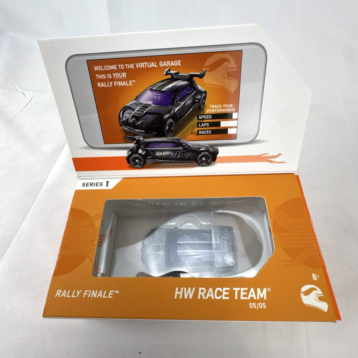 Hot Wheels id Series 1 Rally Finale 1:64 scale diecast car in satin black with purple glass in collector display box