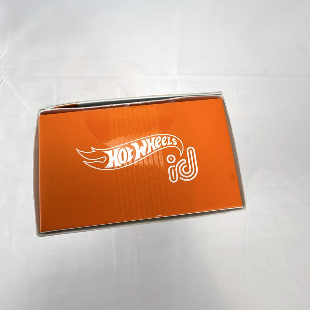 Hot Wheels id 1:64 scale Fiat 500e diecast car in metallic orange pizza delivery livery