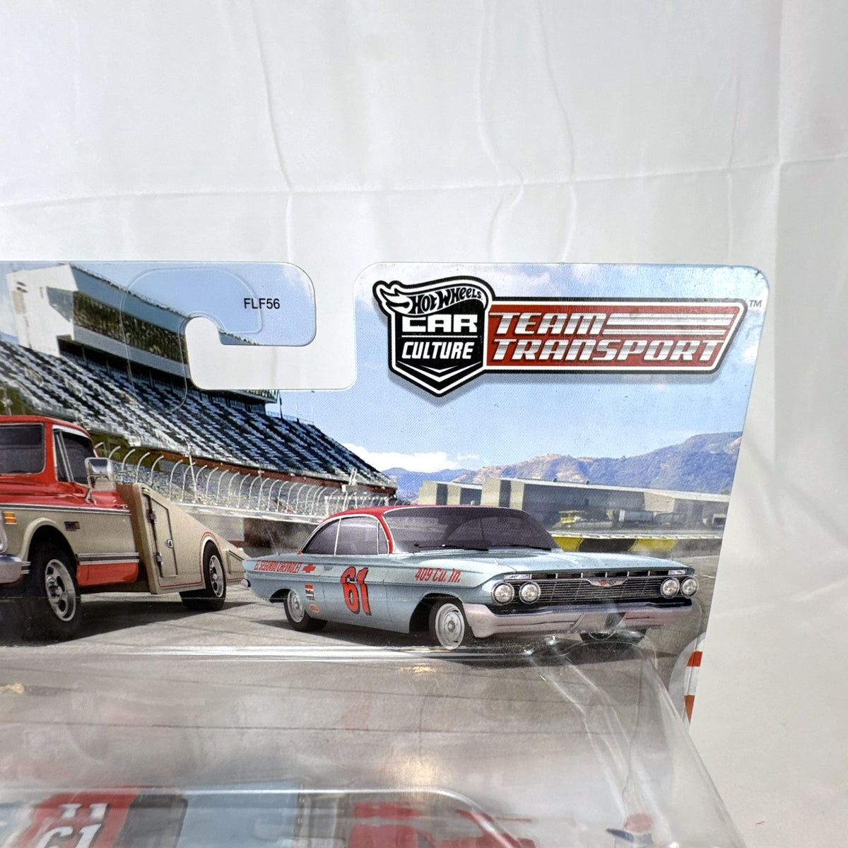 Hot Wheels Team Transport 1:64 scale '61 Chevy Impala and '72 Ramp Truck diecast set in sealed blister packaging