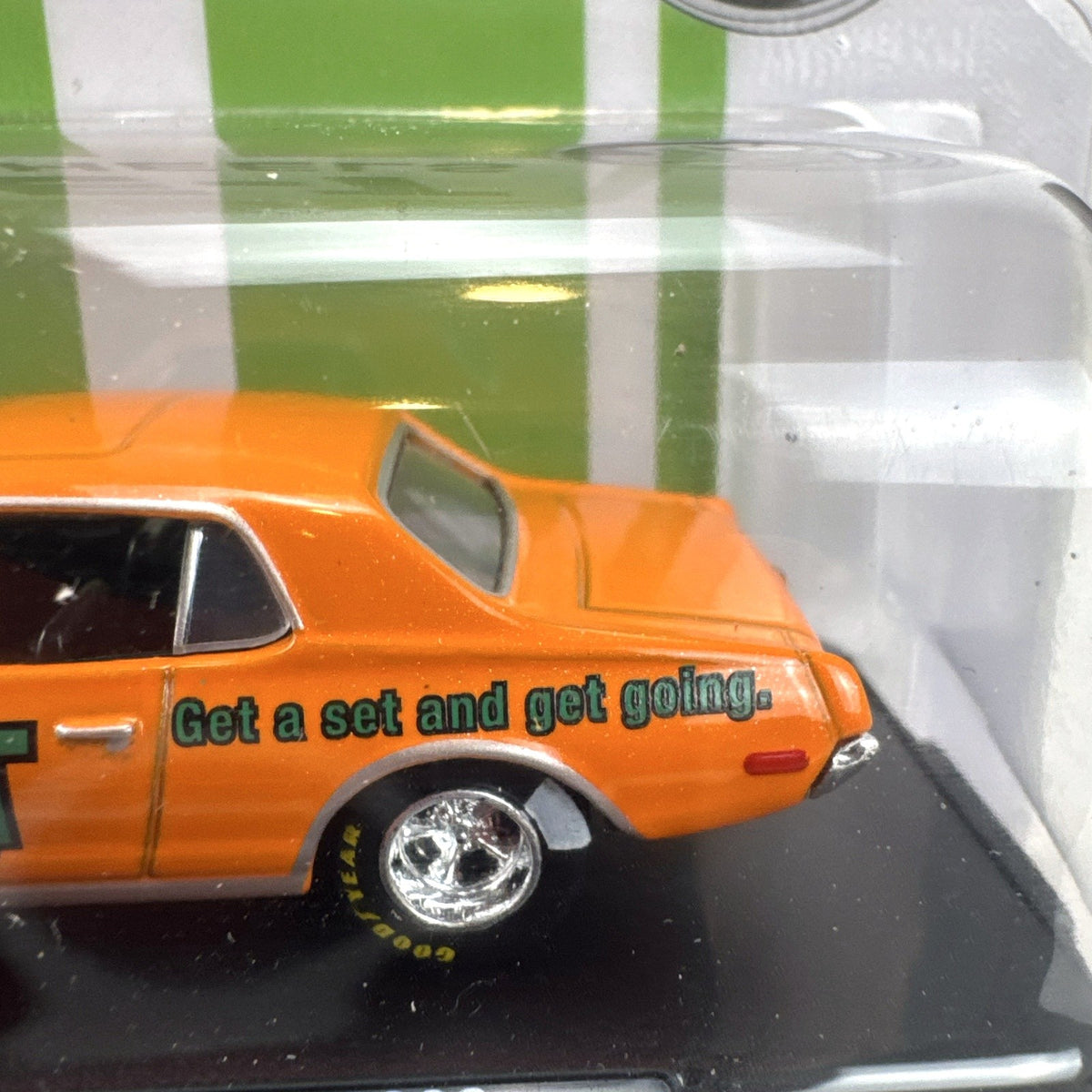 M2 Machines 1:64 scale 1968 1/2 Mercury Cougar R-Code diecast car in orange with ET Mags livery in sealed packaging