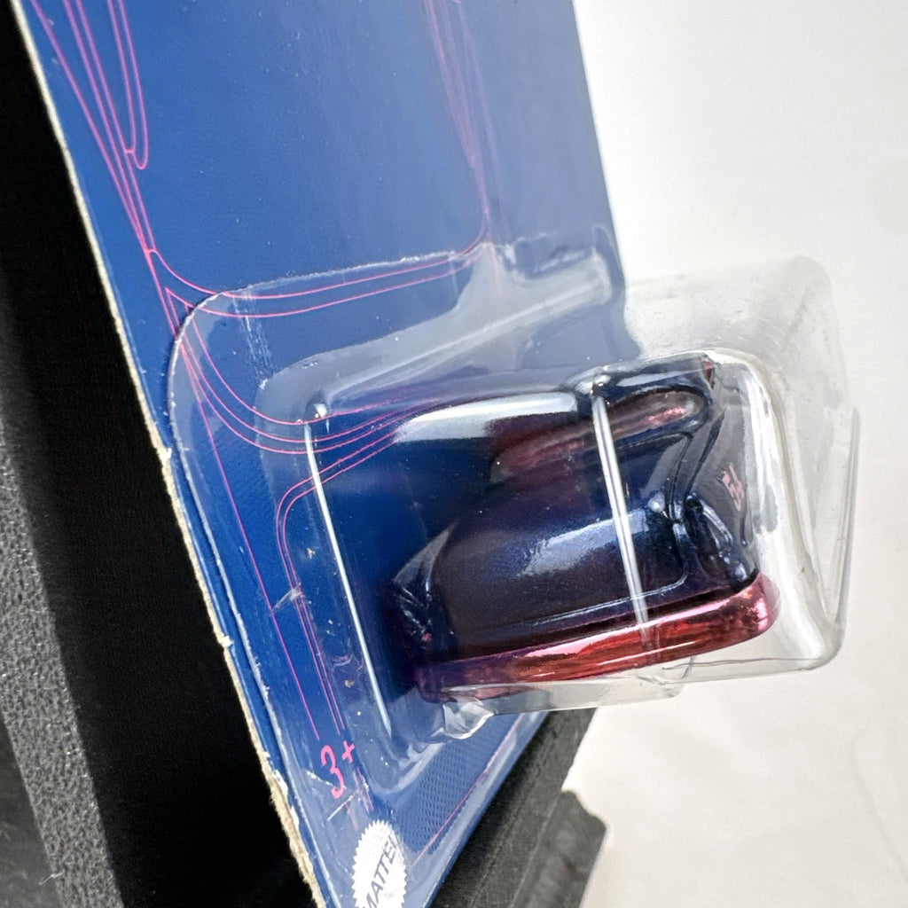 Sealed Hot Wheels 54th Anniversary Custom '53 Chevy 1:64 scale diecast car in metallic blue with pink graphics