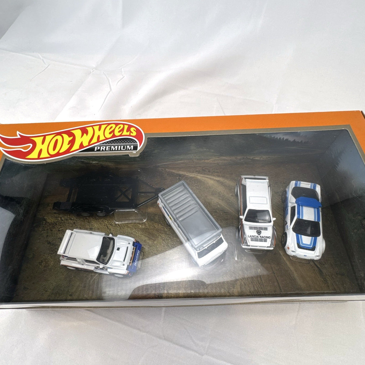 Hot Wheels Premium Rally Diorama Set 1:64 scale diecast 4-pack featuring Ford RS200, Lancia Delta, MG Metro, and Hauler.