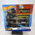 Hot Wheels 1:64 scale 8-car multipack in box featuring exclusive gold Nissan Skyline HT 2000GT-X