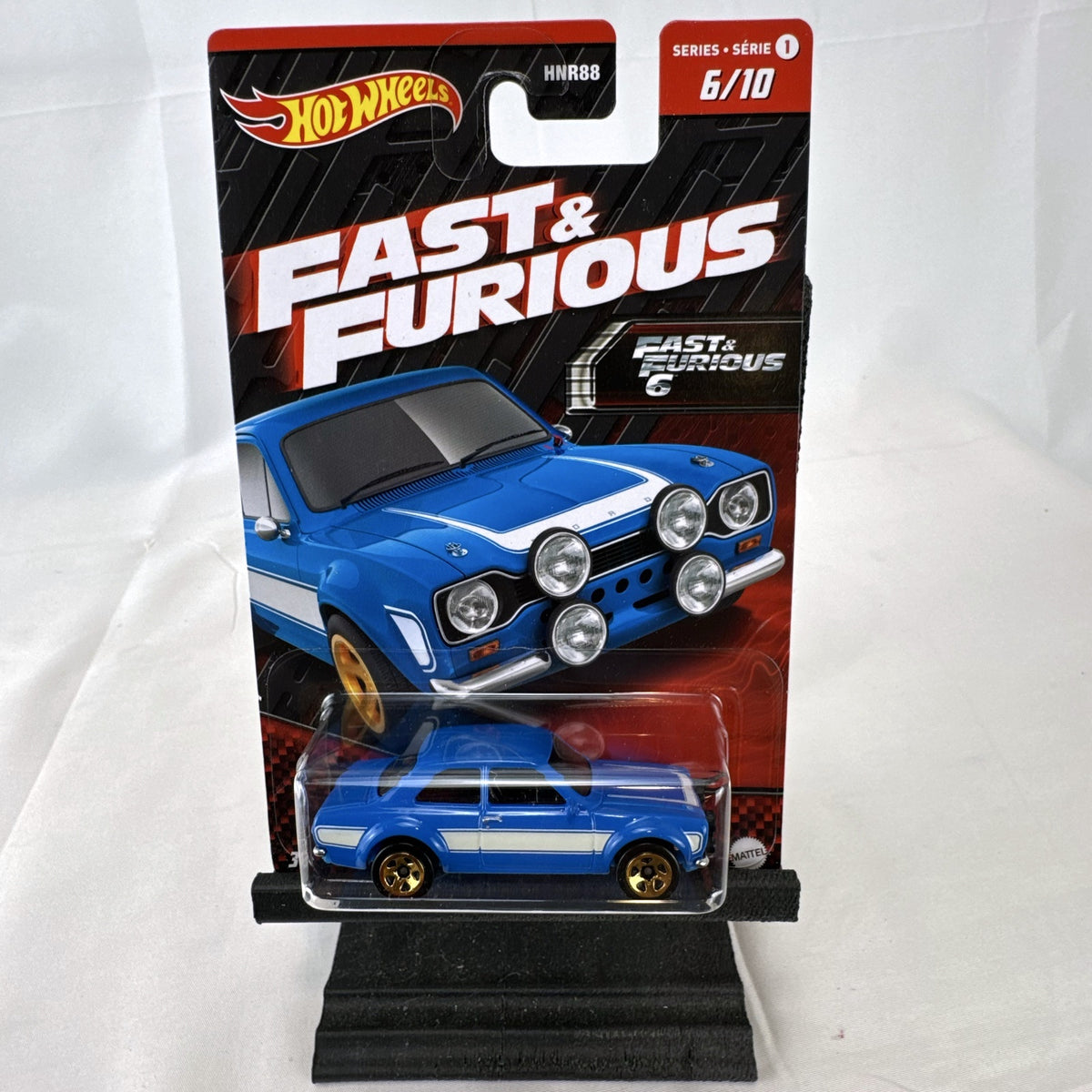 Hot Wheels 1:64 scale 1970 Ford Escort RS1600 diecast car in blue from Fast and Furious, factory sealed