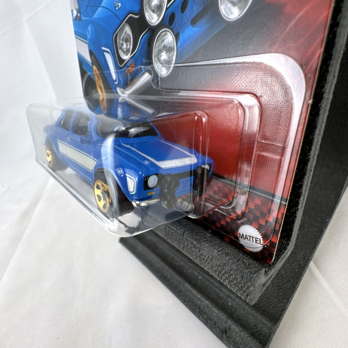 Hot Wheels 1:64 scale 1970 Ford Escort RS1600 diecast car in blue from Fast and Furious, factory sealed