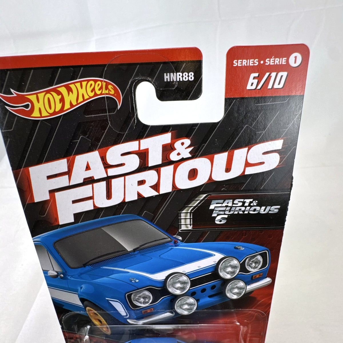 Hot Wheels 1:64 scale 1970 Ford Escort RS1600 diecast car in blue from Fast and Furious, factory sealed