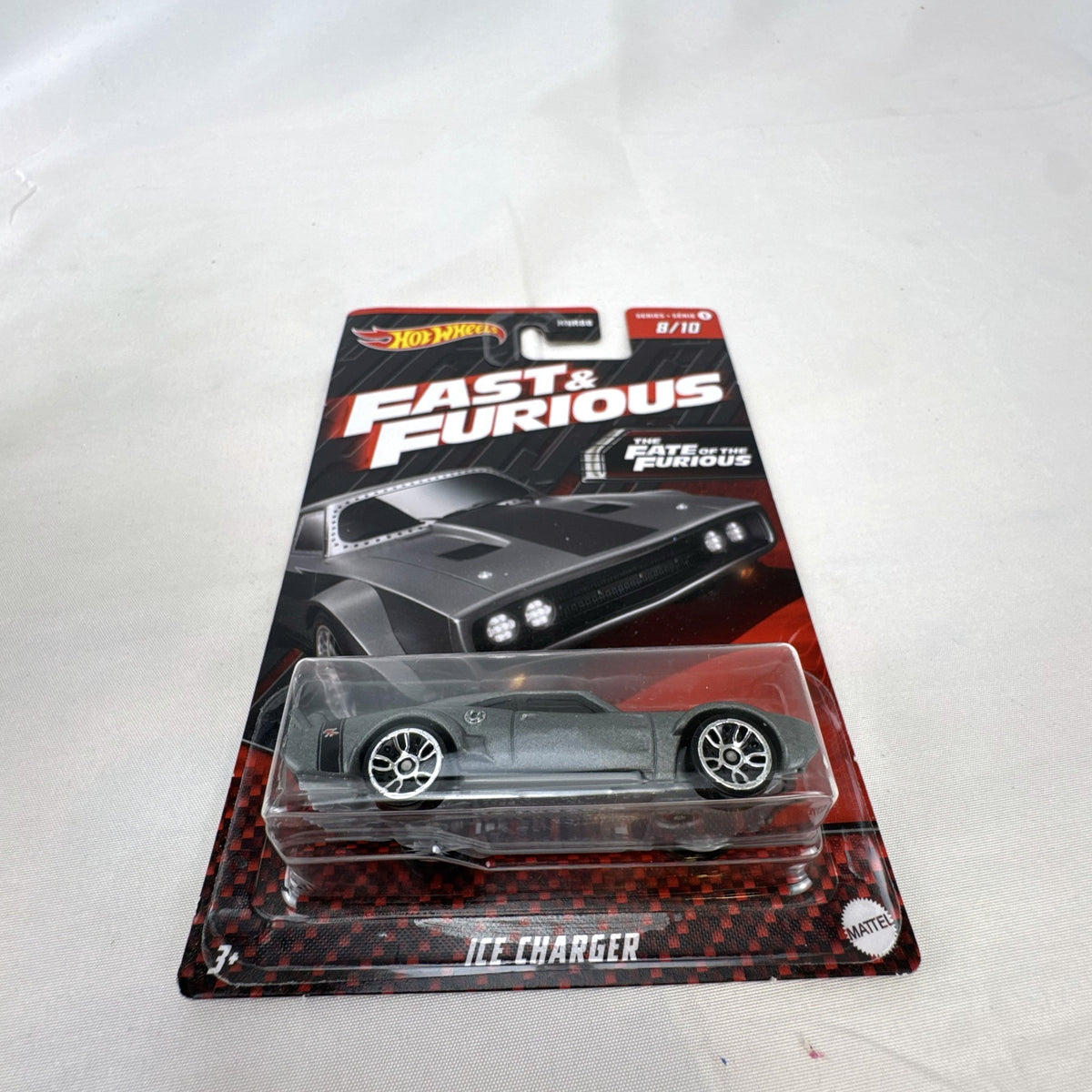 Hot Wheels 1:64 scale Fast & Furious Ice Charger diecast car in original unopened cardback packaging.