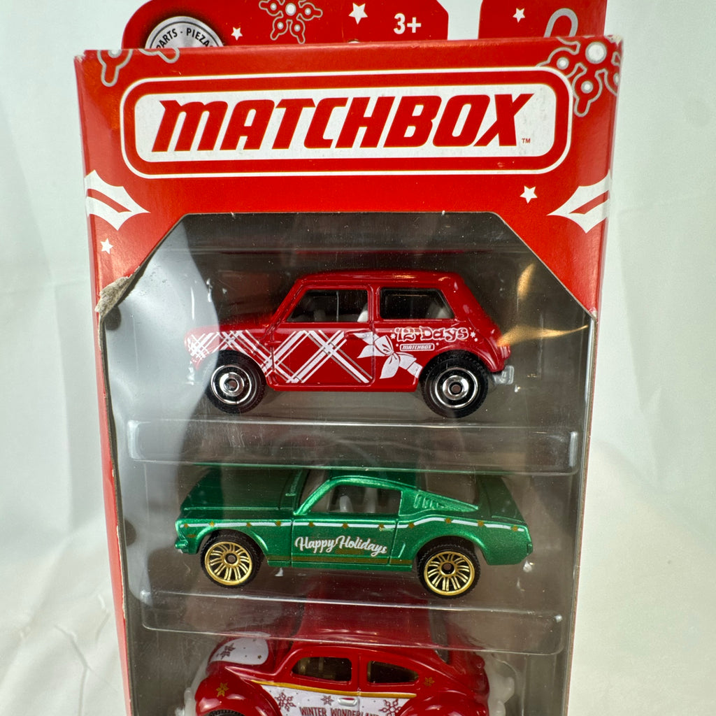 Factory sealed Matchbox Holiday 5-pack 1:64 diecast car set featuring Ford Mustang GT, VW Beetle, and Mini Cooper.