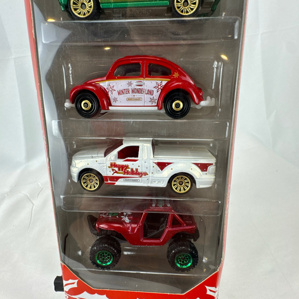 Factory sealed Matchbox Holiday 5-pack 1:64 diecast car set featuring Ford Mustang GT, VW Beetle, and Mini Cooper.