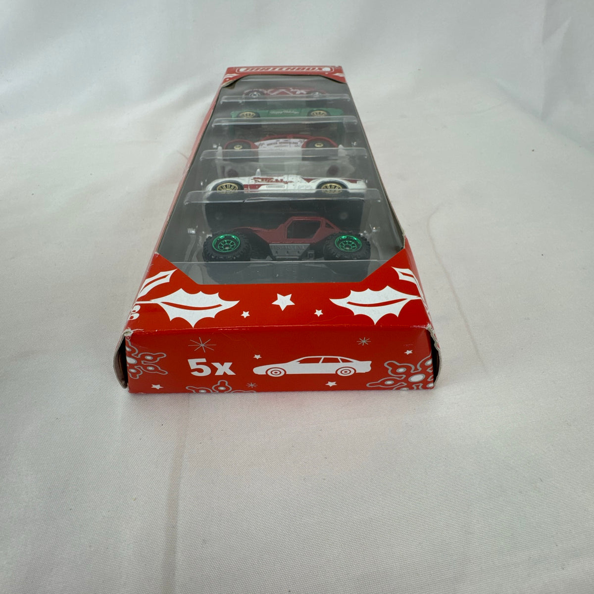 Factory sealed Matchbox Holiday 5-pack 1:64 diecast car set featuring Ford Mustang GT, VW Beetle, and Mini Cooper.