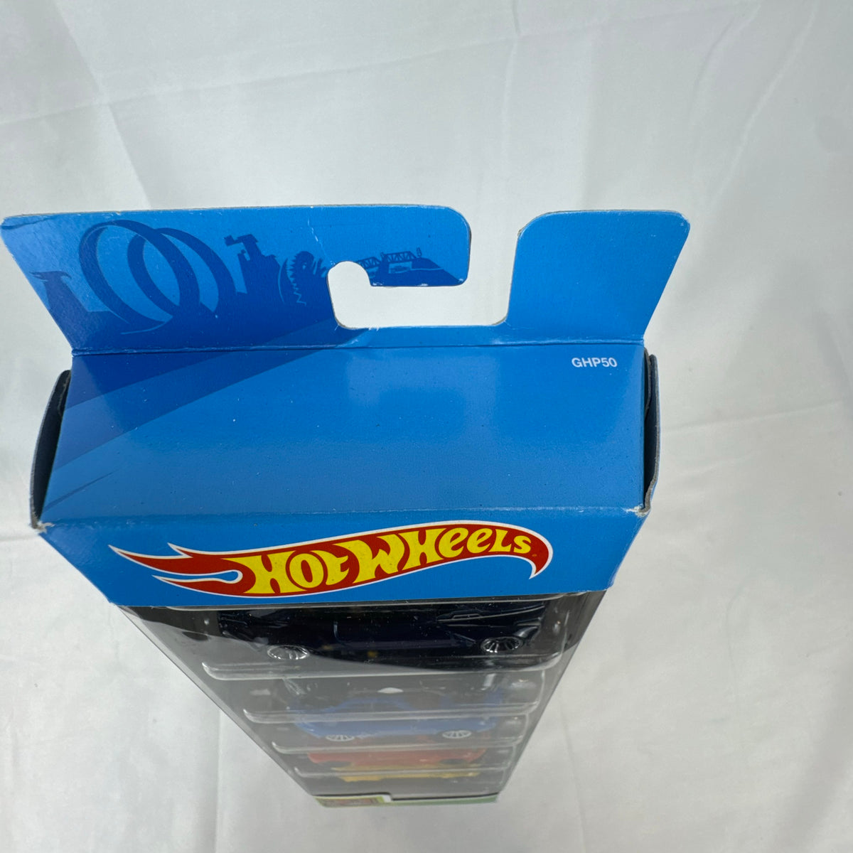 Hot Wheels HW Exotics factory sealed 5-pack set containing McLaren, Porsche, Jaguar, Aston Martin, and Cadillac diecast cars.