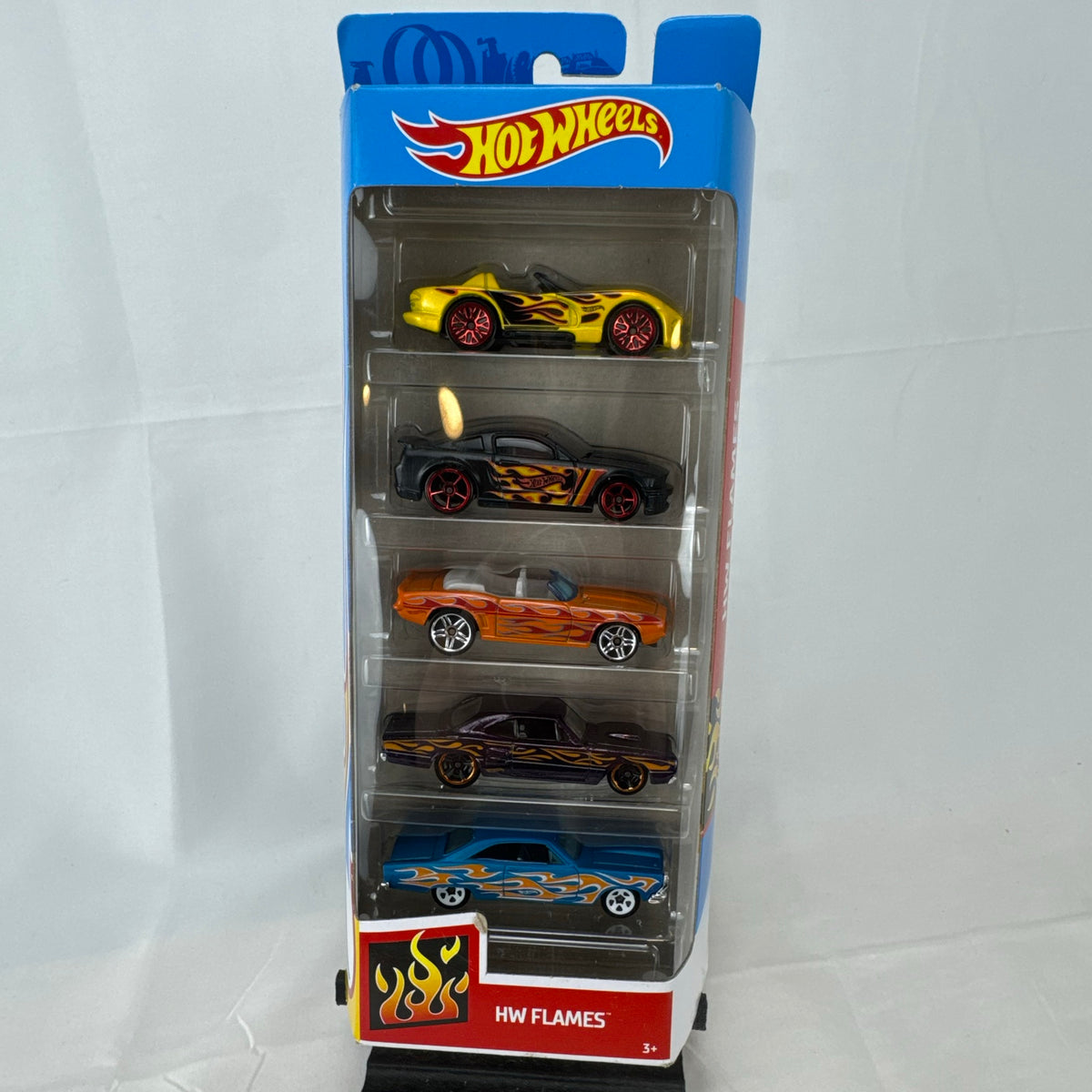 Factory sealed Hot Wheels HW Flames 5-pack 1:64 diecast cars including Mustang, Camaro, Viper, Coronet, and Fairlane.