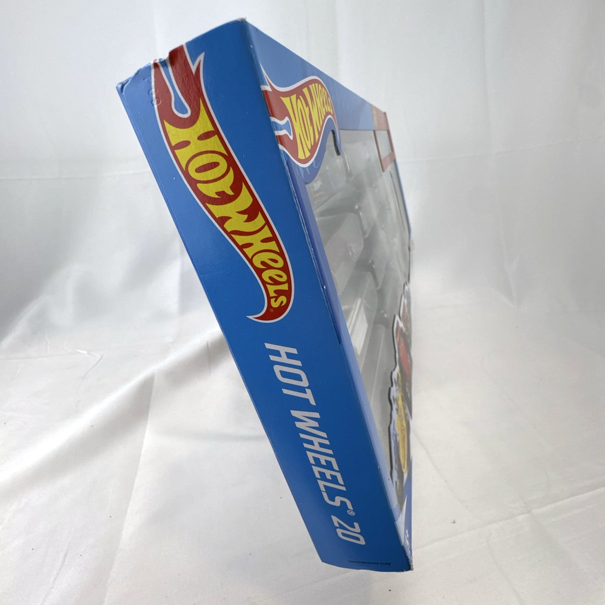 Hot Wheels 20-car diecast 1:64 scale multipack featuring classic muscle cars and modern supercars.
