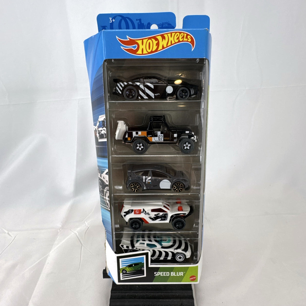 Hot Wheels Speed Blur 5-car diecast vehicle set in 1:64 scale featuring Ford Mustang GT and Jeepster Commando