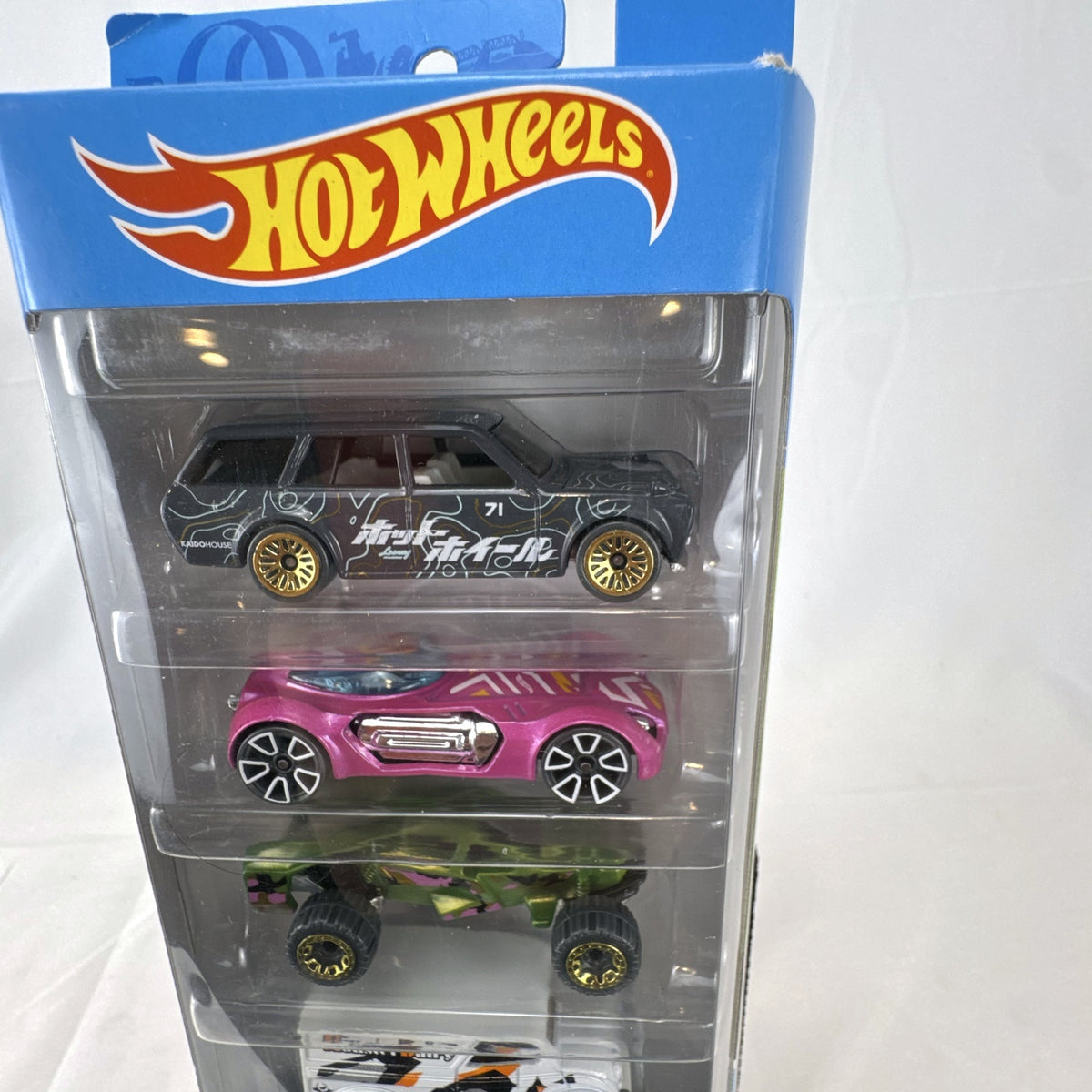Hot Wheels Speed Blur 5-car diecast set in 1:64 scale featuring the 1971 Datsun 510 Wagon and custom vehicles.