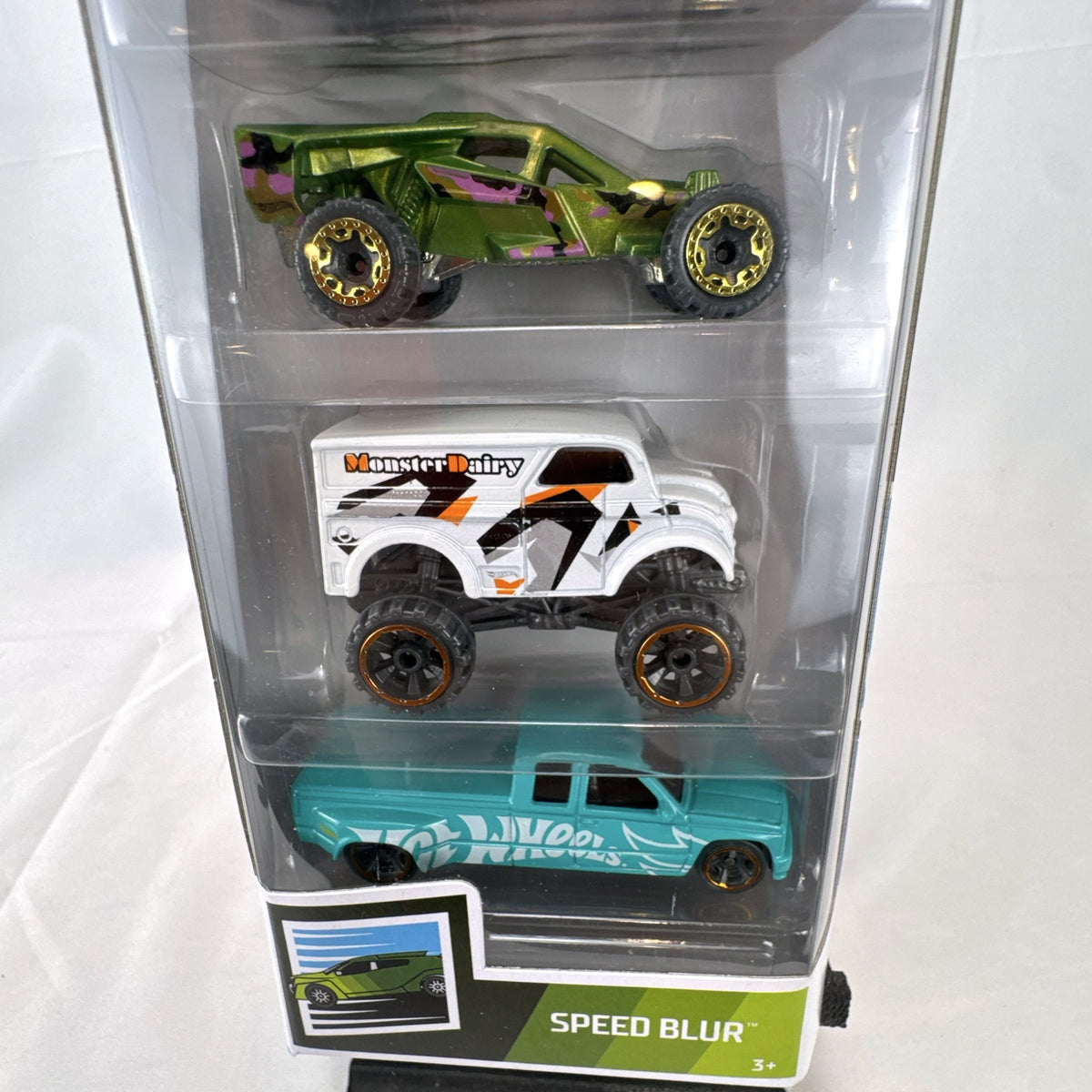 Hot Wheels Speed Blur 5-car diecast set in 1:64 scale featuring the 1971 Datsun 510 Wagon and custom vehicles.