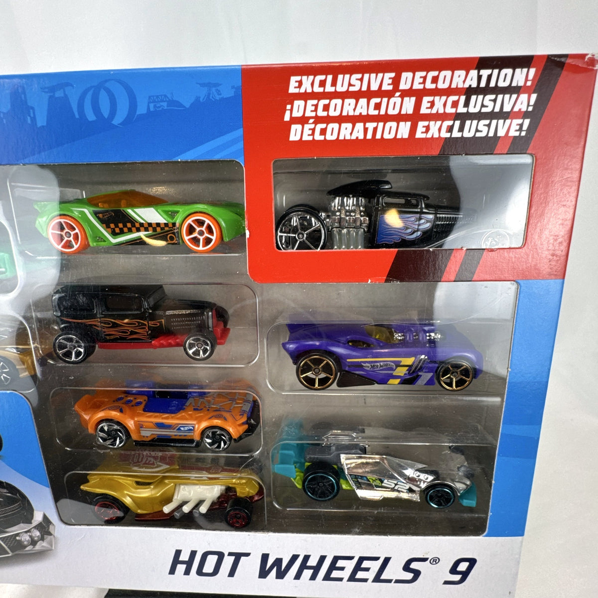 Hot Wheels 9-car boxed gift set including 1:64 scale diecast vehicles and exclusive black Bone Shaker hot rod
