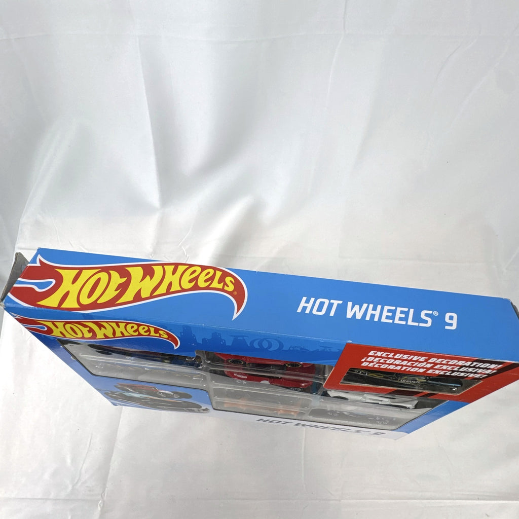 Hot Wheels 1:64 scale 9-car diecast lot including exclusive black '52 Hudson Hornet with flame graphics.