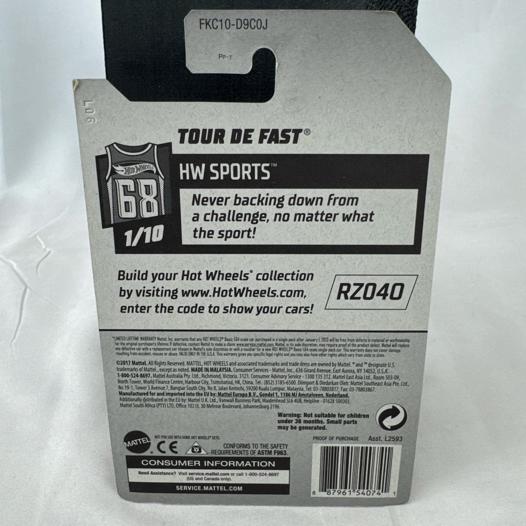 Hot Wheels Tour De Fast 1:64 scale diecast car in metallic gold on original blister card