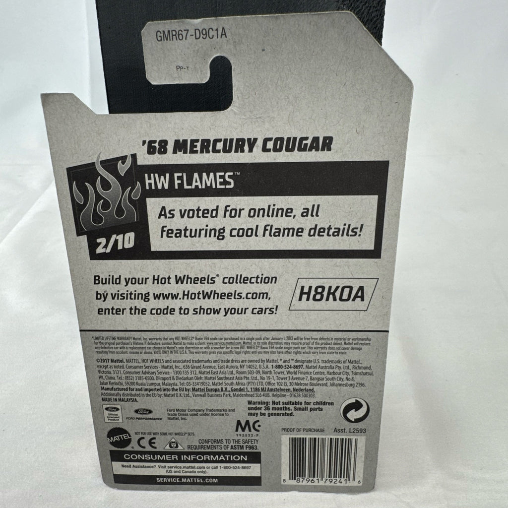 Hot Wheels 1:64 scale diecast 1968 Mercury Cougar in black with silver flame graphics sealed on blister card