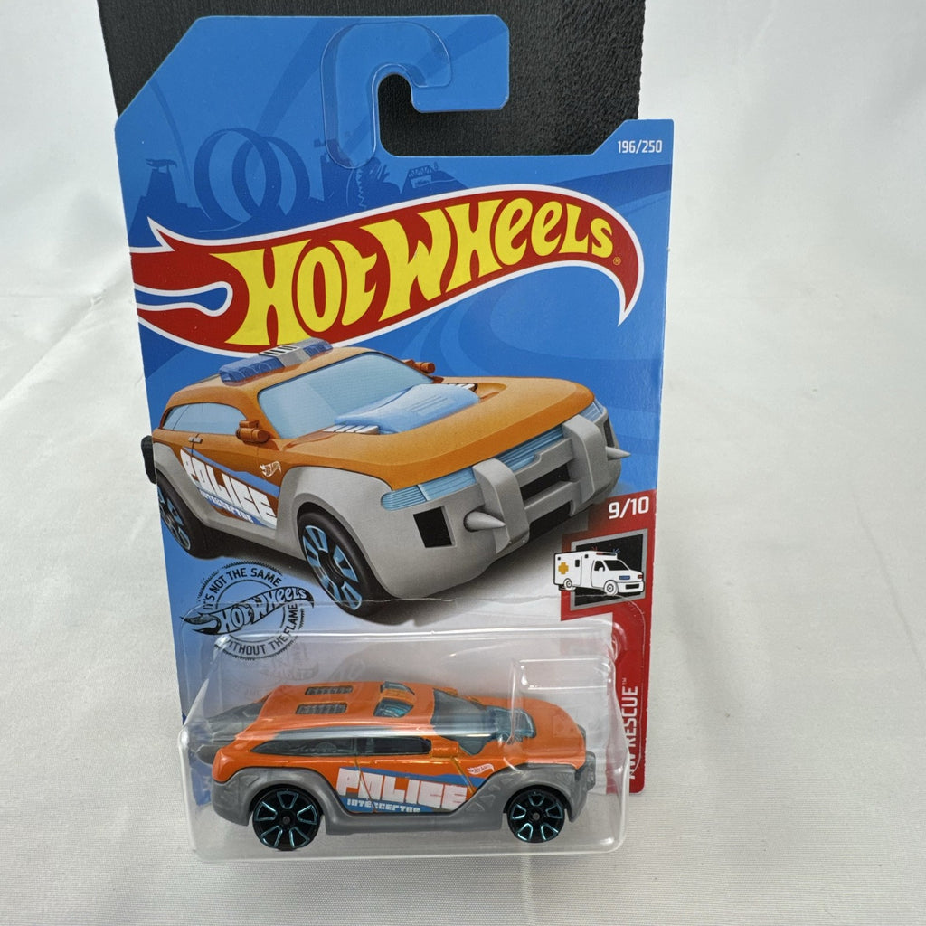 Orange Hot Wheels HW Pursuit 1:64 scale police interceptor diecast car sealed on original card package.