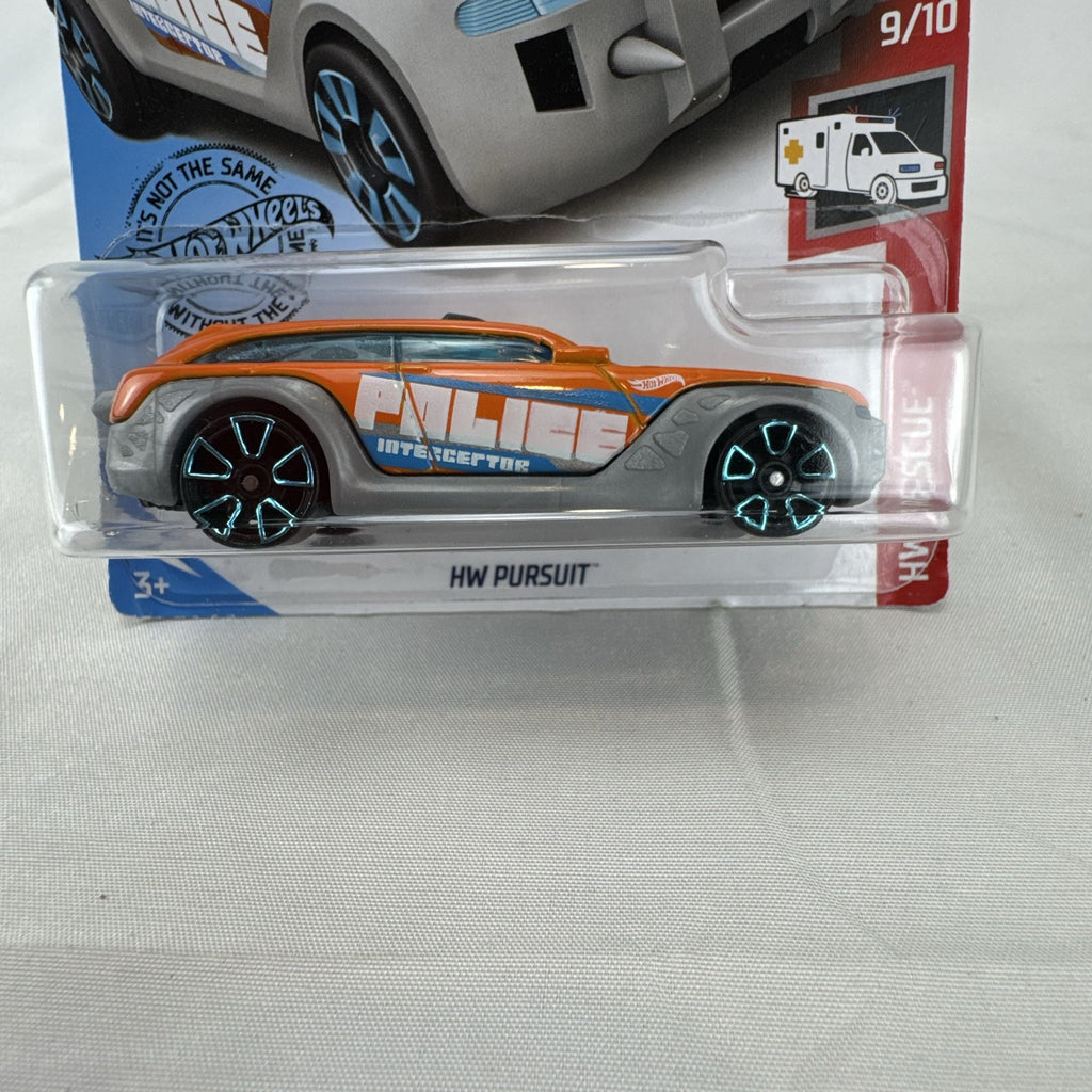 Orange Hot Wheels HW Pursuit 1:64 scale police interceptor diecast car sealed on original card package.
