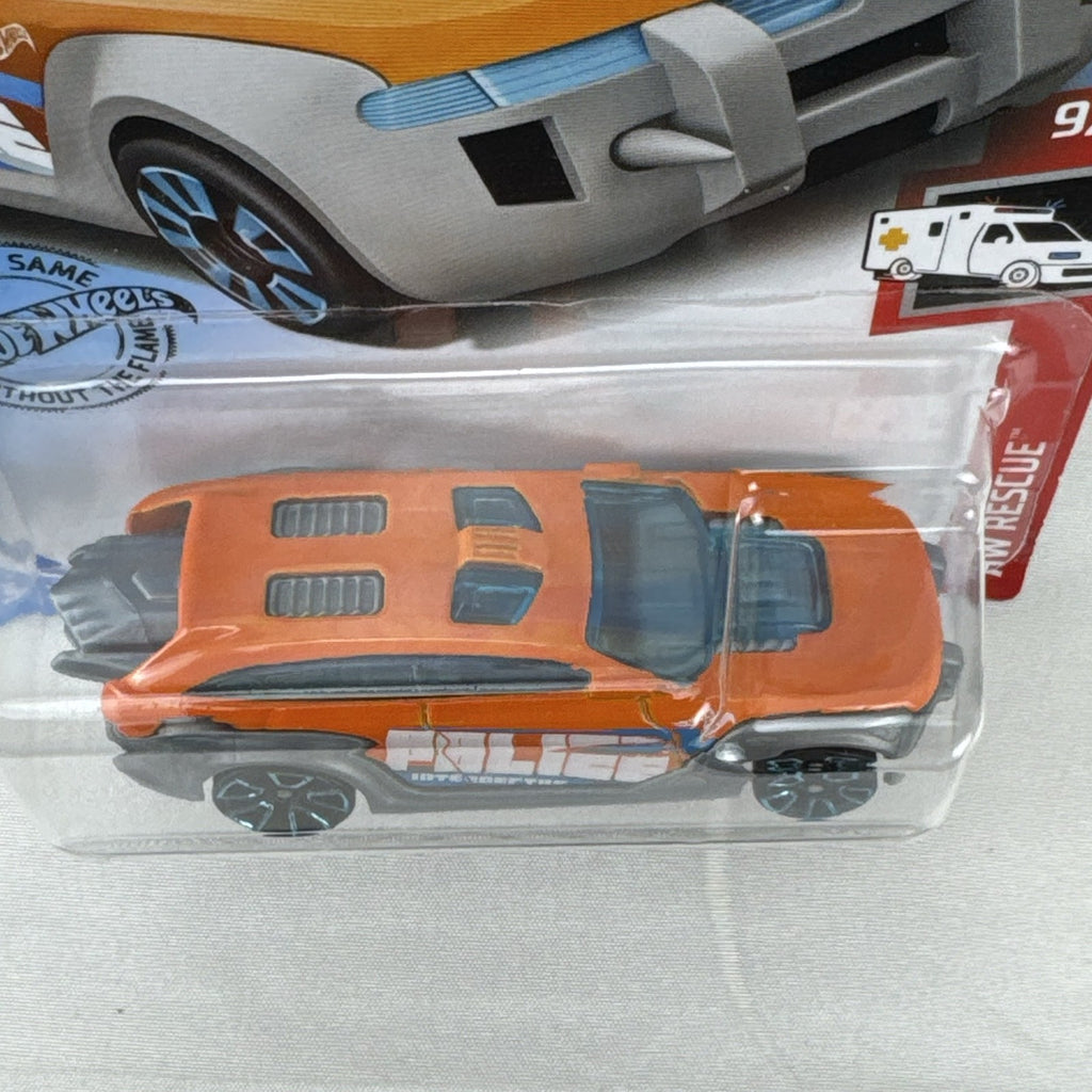 Orange Hot Wheels HW Pursuit 1:64 scale police interceptor diecast car sealed on original card package.