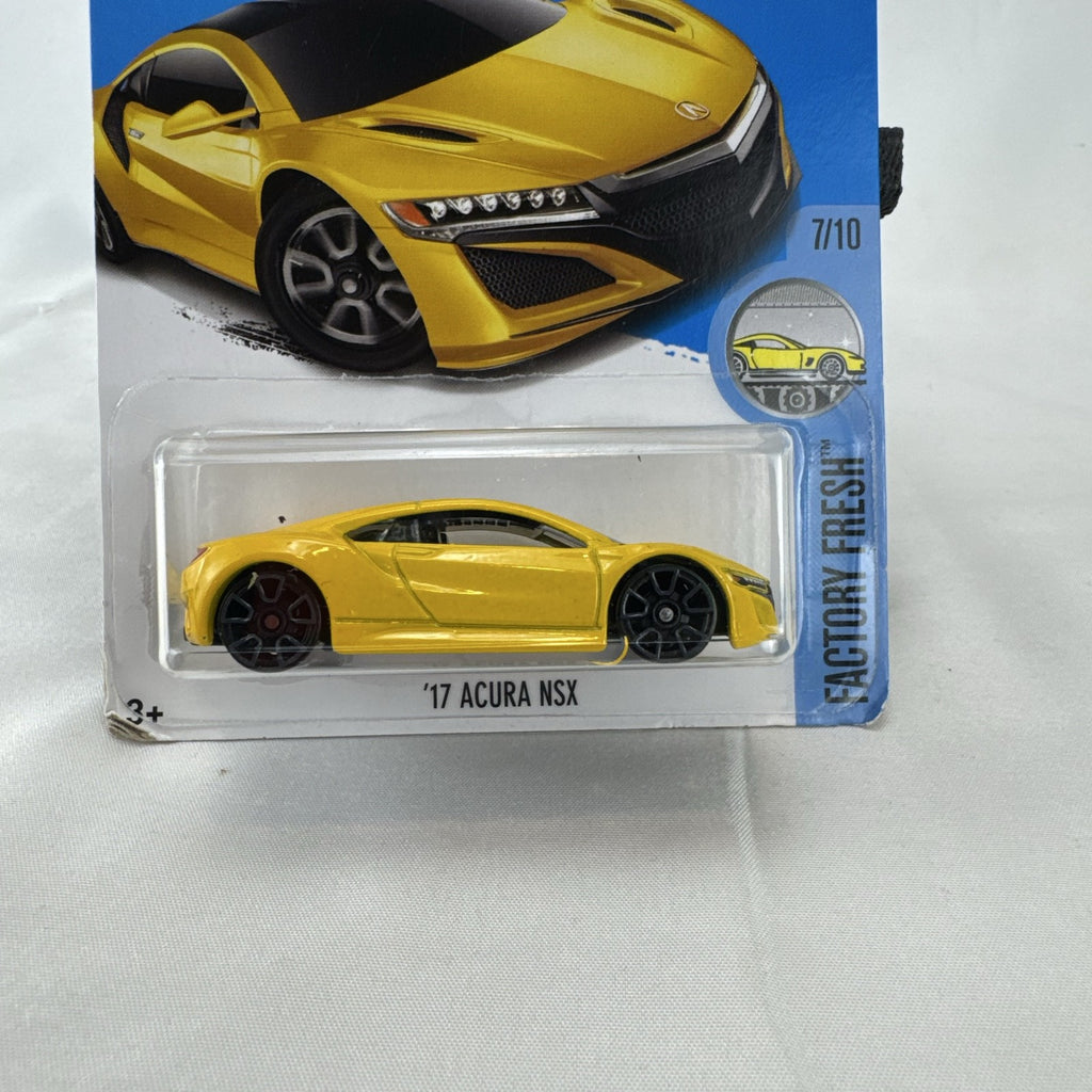 Hot Wheels 1:64 scale 2017 Acura NSX diecast car in bright yellow in original unopened blister pack