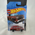 Sealed Hot Wheels 1955 Chevy Nomad diecast car in weathered red from the Rod Squad series