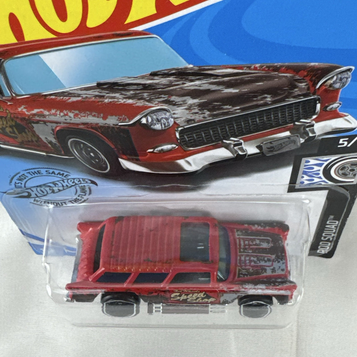 Sealed Hot Wheels 1955 Chevy Nomad diecast car in weathered red from the Rod Squad series