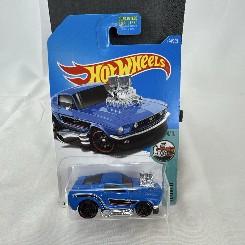 Hot Wheels Tooned '68 Ford Mustang 1:64 diecast car in blue with chrome engine in original packaging