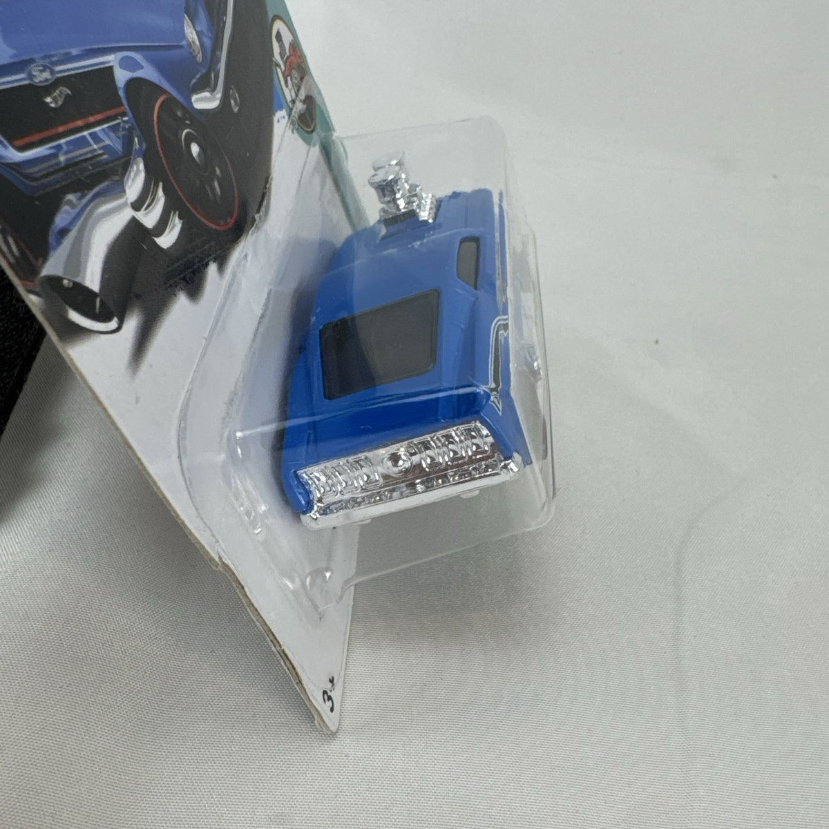 Hot Wheels Tooned 1968 Ford Mustang 1:64 scale diecast car in blue on blister card