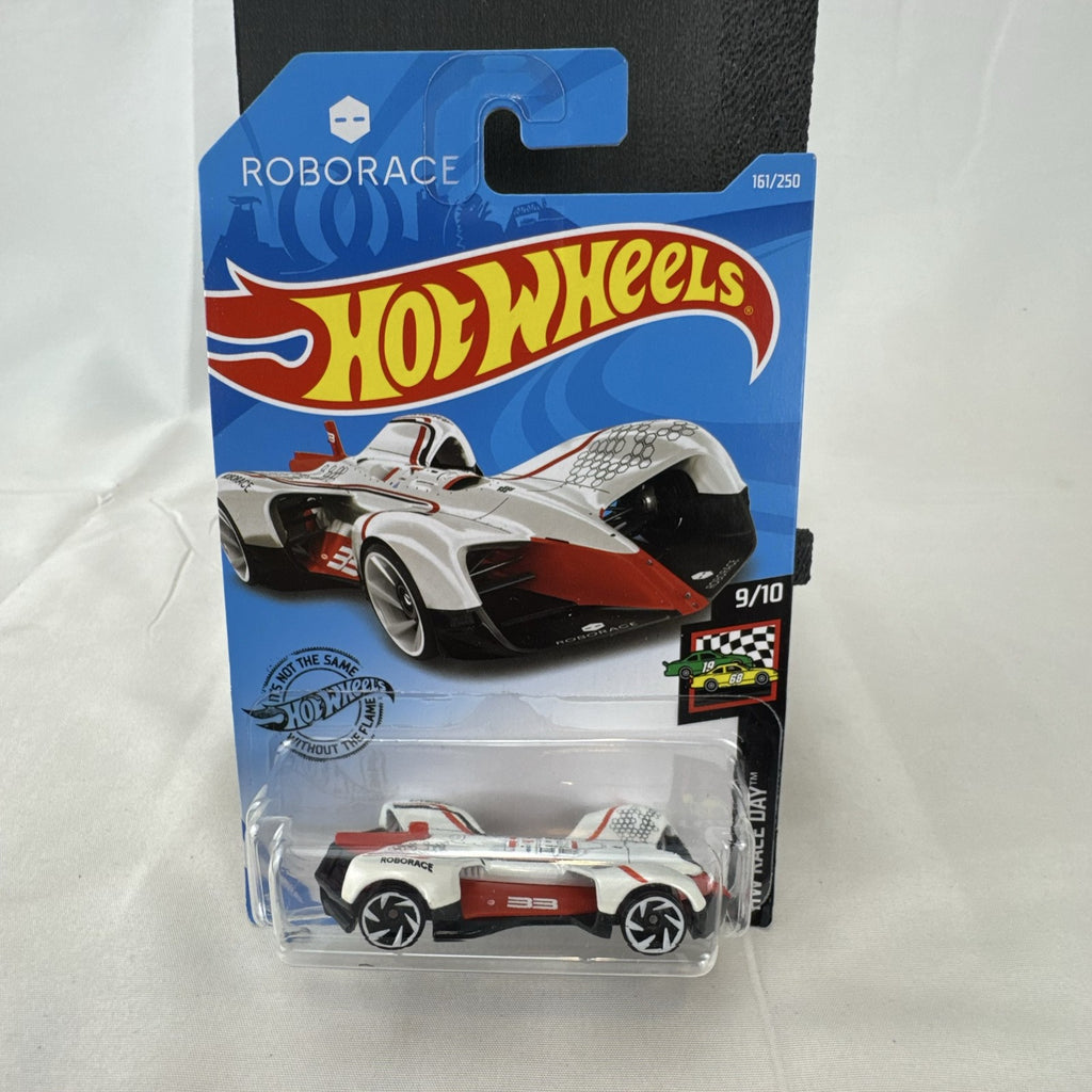Hot Wheels 1:64 scale diecast Roborace Robocar in white with red accents in original blister pack.