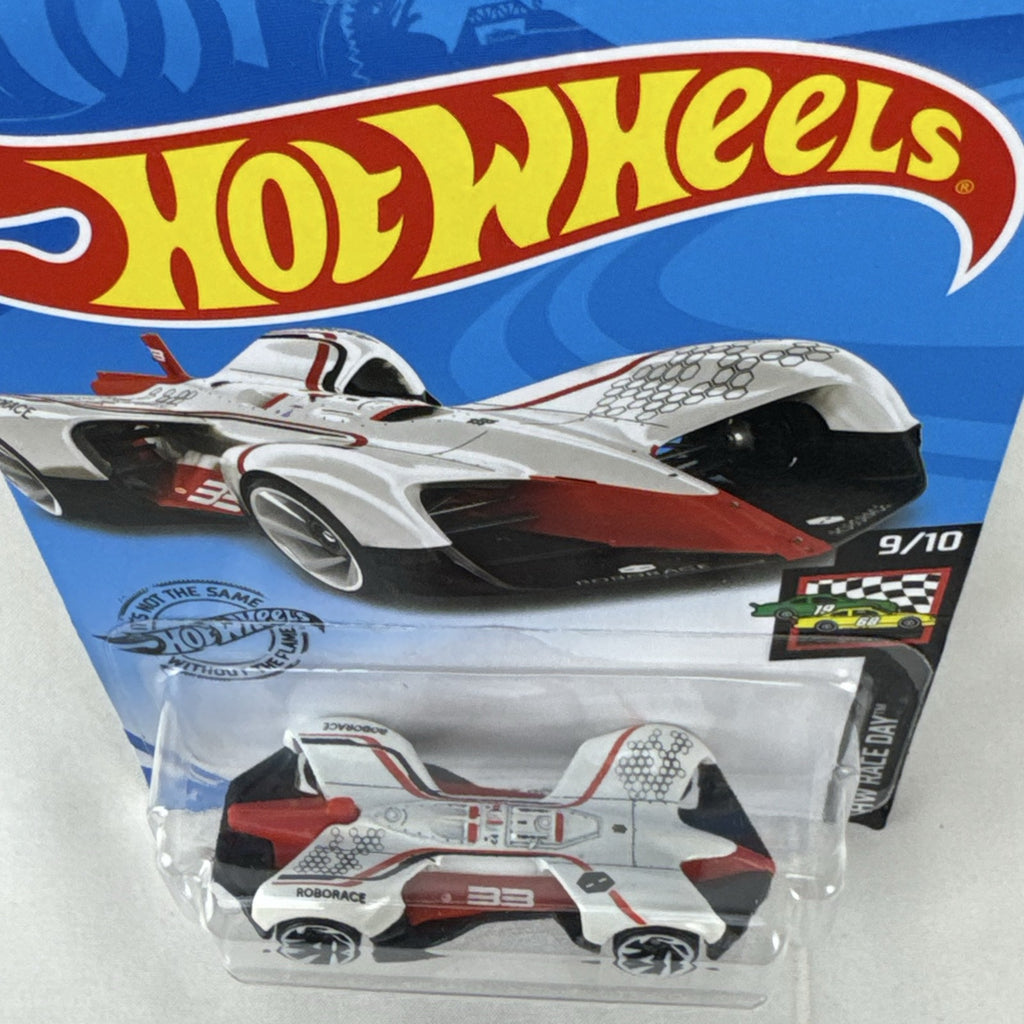 Hot Wheels 1:64 scale diecast Roborace Robocar in white with red accents in original blister pack.