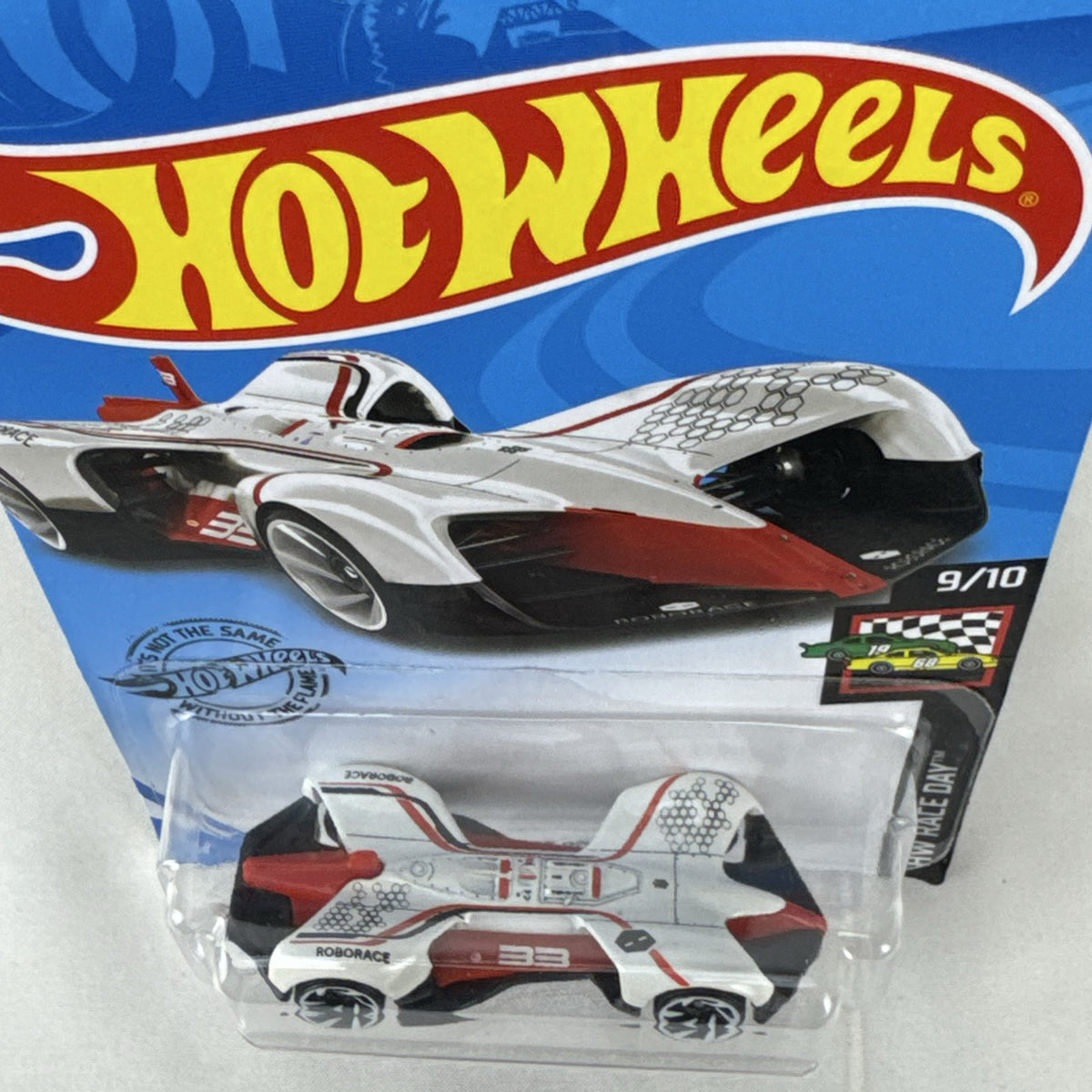 Hot Wheels 1:64 scale diecast Roborace Robocar in white with red accents in original blister pack.