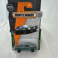 Matchbox 1970 Plymouth Cuda 1:64 scale diecast car in metallic green on original card
