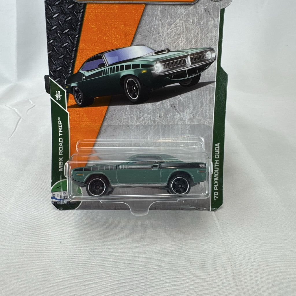 Matchbox 1970 Plymouth Cuda 1:64 scale diecast car in metallic green on original card