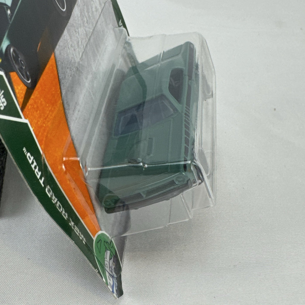Matchbox 1970 Plymouth Cuda 1:64 scale diecast car in metallic green on original card