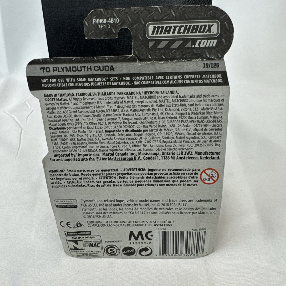 Matchbox 1970 Plymouth Cuda 1:64 scale diecast car in metallic green on original card