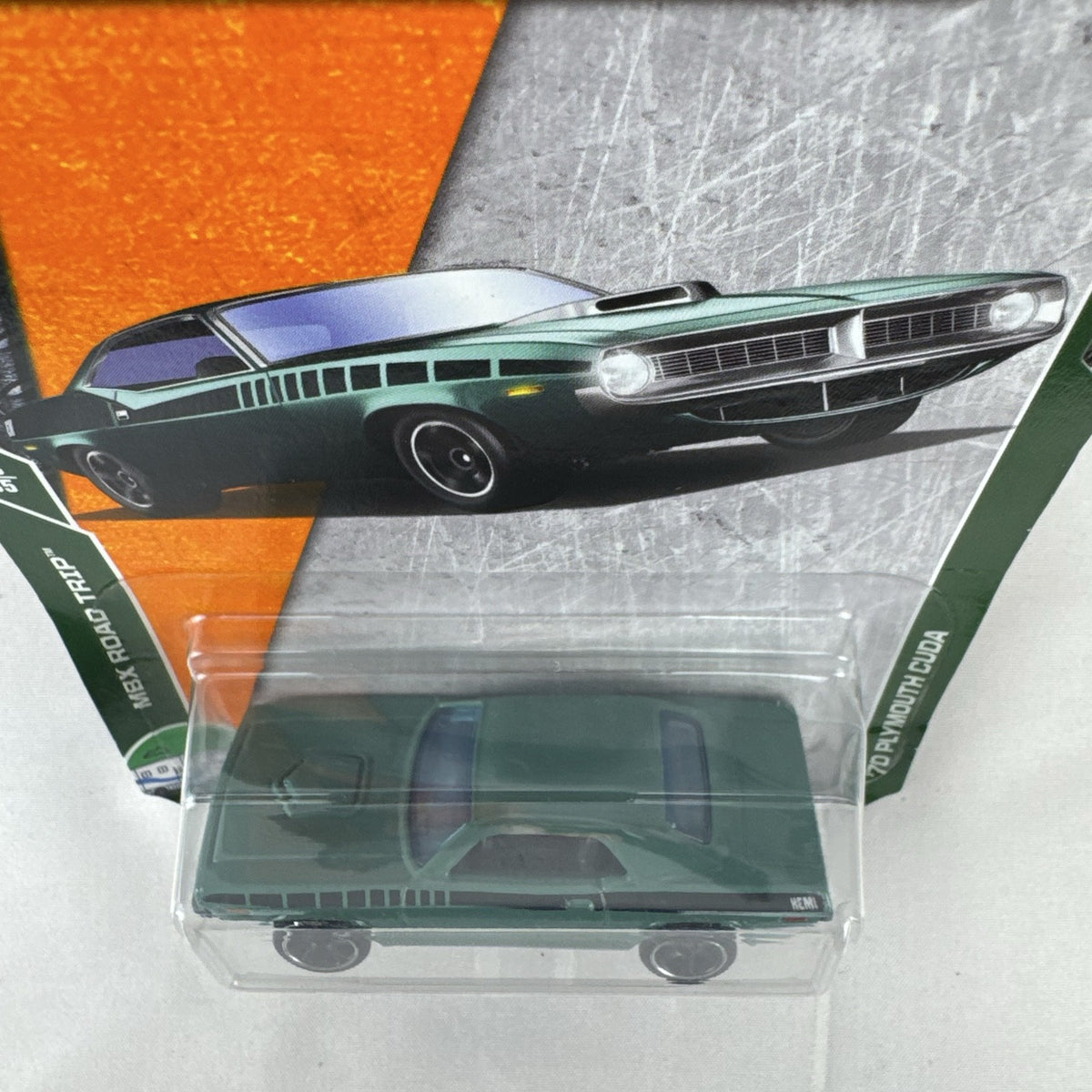 Matchbox 1970 Plymouth Cuda 1:64 scale diecast car in metallic green on original card