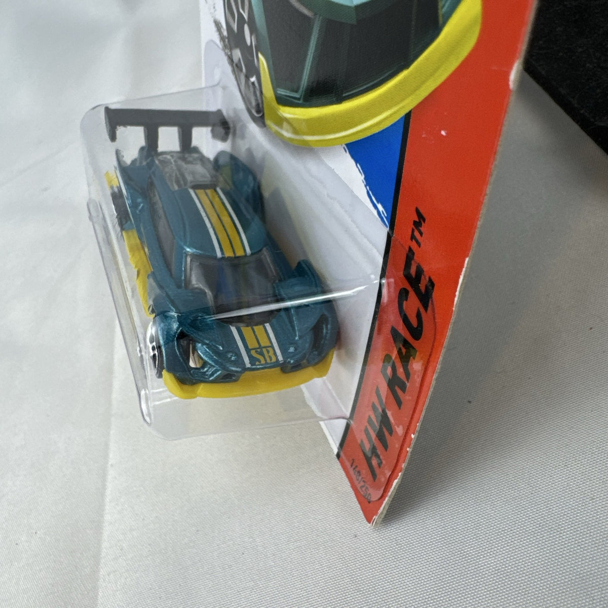 Hot Wheels Super Blitzen 1:64 diecast racer in metallic blue, packaged on original 2015 blister card.