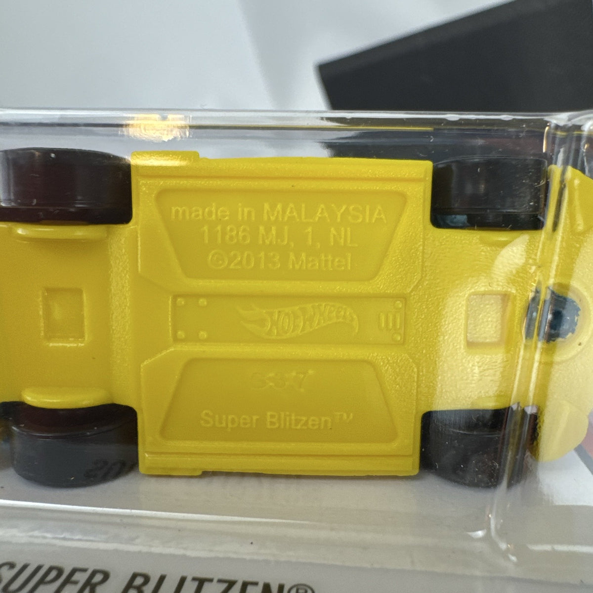 Hot Wheels Super Blitzen 1:64 diecast racer in metallic blue, packaged on original 2015 blister card.