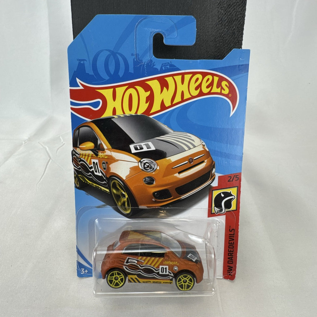 Hot Wheels Fiat 500 diecast car in bright orange sealed in HW Daredevils short card packaging